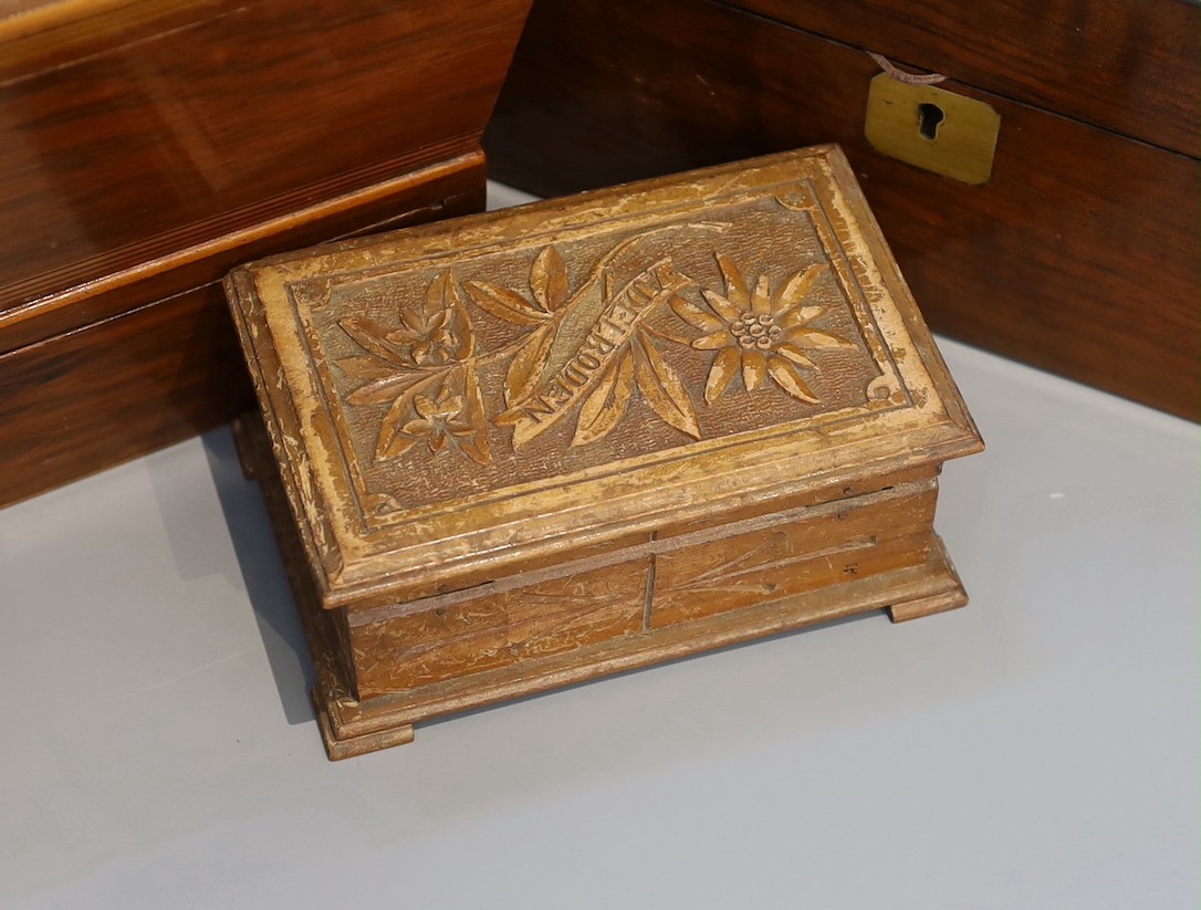 A Victorian mahogany sarcophagus work box, width 30 cms, a Victorian walnut sewing box and three others.